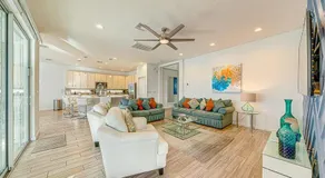 #371-Stunning 6 bed with modern decor, south facing pool and spa overlooking water - Image 3