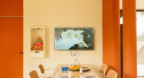 SaffronStays Ivory and Orange - Image 4