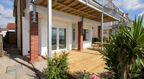 Apartamento vacacional con barbacoa, internet de alta velocidad y jardín | Vistas al agua - Image 4
