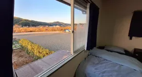 Guesthouse ONAKA 巡礼の宿 Pilgrim's Inn 家主居住型民泊 - Image 4