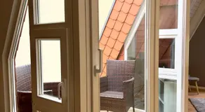 Gemütliche Maisonettewohnung mit Dachterrasse am Schloß - Image 4