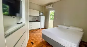 Prado Premium Lofts e Kitnets com Ar-Condicionado e TV Smart - Image 4