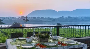 SaffronStays Lake House Bouganvillea, Nashik - rustic pool villa with great lake views and patio dining - Image 3