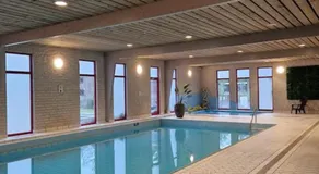 6 persoons chalet op de Veluwe bij binnen en buiten zwembad - Image 3