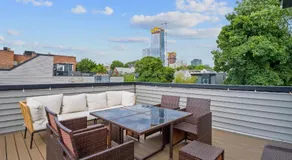 Elegant 2BR-2BA Spacious Escape with Rooftop Near NYC - Image 5