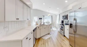 The Barefoot Bungalow | House in Palm Coast with an enclosed pool & grill - Image 3