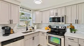Right at Home Stays - Modern 2BR 2BA with Yard & Fireplace - Image 4