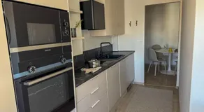A beautiful renovated top floor apartment in city center - Image 4