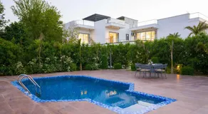 ELIVAAS AdhiVa 5-BHK Farmhouse with Private Pool, Bar & Lush Garden - Image 3