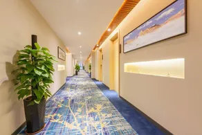 Qiyue Hotel Dalian - Image 4