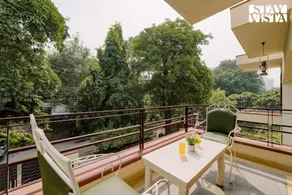StayVista Residences at Moets Palm - Apartments with Home Theatre & Shared Pool - Image 5
