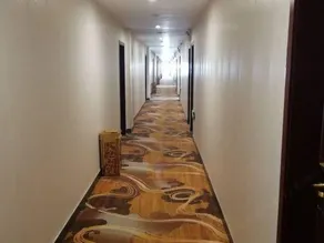 Xingainian Business Hotel - Image 4