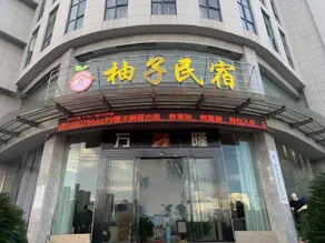 Wanlong Business Hotel - Image 2