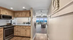 Ocean-view condo with a scenic balcony & W/D - pool and beach access - Image 4
