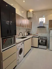 شقة فاخرة بغرفتين نوم وجلسة خارجية - Image 2