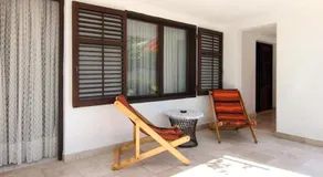 Acogedor apartamento vacacional con terraza y jardín | Vistas al jardín | Cerca de la playa | Admite perro - Image 3