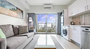 High-Rise Modern Oasis with Pool and City Views - Image 2