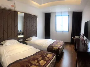 Huansha Business Hotel - Image 4