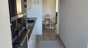 A beautiful renovated top floor apartment in city center - Image 5
