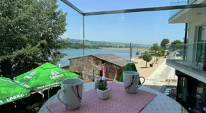 Apartmani Tašić Lakeview Studio - Image 3
