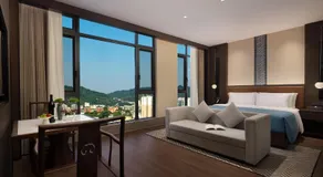 Yunmeng Riverview Hotel-Newly Opened 2026 Free Pick-up Service Rooftop Infinity Pool Kids Playground On-site Café Near Fenghuang Scenic Area - Image 2