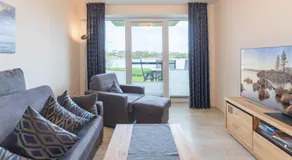 Ferienwohnung Nord-West - direkt am Nordseedeich mit Blick auf den See - Image 2
