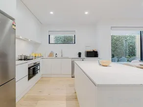 Stylish 4BR Townhouse with Private Courtyard - Image 3