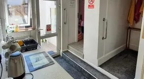 PAIGNTON S ONLY Ground floor Garden 2 Bedroom Apartment in front of the Pier & your Very own Private FREE Car space ,2 Double beds , 2 Single Beds , Kitchen , Air Fryer , 50 Blue ray Films ,Hotel Reception to Greet & Happily Help you - Image 3