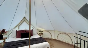 Enchanting Mountain Glamping Tents with Elevated Decks and Fire Pit Near Gentry, AR - Image 2