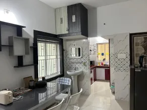 Rumi HomeStays-205 A-Premium Furnished Room with Kitchen & Dining - Image 3