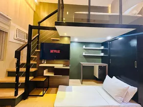 Cozy king bed with sofa bed Sunvida Tower Across SM Cebu with Balcony - Image 2