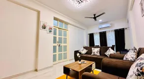 Palm View 1BHK with Pool & Café - Sazo Stays - Image 2