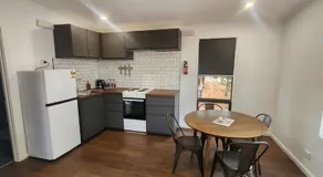 Glossy Black Cabin - Image 3