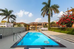 StayVista's Brookvale Cottage - Dive into tranquility with pool view and gazebo - Image 4