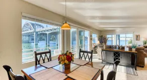 Incredible Riverfront Oasis with Wraparound Deck & Cozy Interior - Image 3