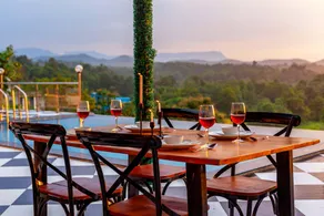 StayVista's Vine & Splash - Riverside villa with an infinity pool and indoor games - Image 4