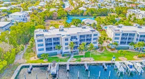 Ocean View Duplex Penthouse Retreat amenities: tennis court heated Pool Vista Key One - Image 4
