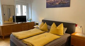 Ferienwohnungen & Apartments Heintz - Ihre Unterkunft am Marktplatz in Bad Königshofen - Image 2