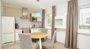 Strandresort Rex Rugia Ferienwohnung 30-8 mit Sauna- und Schwimmbadnutzung im AHOI Sellin - Image 3