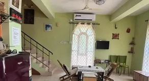 Shantiniketan Bungalow with green lawn - Image 3