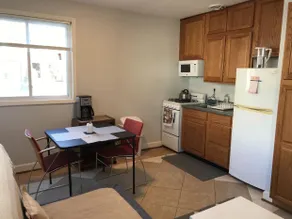 Walk to 2 metro's, furnished studio, private, parking, wifi. - Image 3