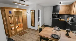 Appartement rénové avec vue panoramique et sauna - Image 4