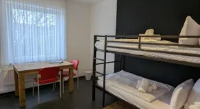 HOSTEL PD23 ALTE FEUERWACHE I 3min CityHospital I 50m Supermarkt I SmartTV I P I Gemeinschaftsküche I Monteure I Kurzurlaub - Image 2