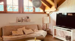 Gemütliche Wohnung mit Ofen und Naturblick - Image 2