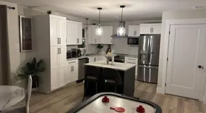 Platinum Homes , Stylish 3BR Home,4 Min to YQM Airport, Sleeps 10 Free Parking - Image 5