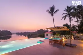StayVista's Waterway Retreat - Lakeside Oasis with Infinity Pool - Image 3
