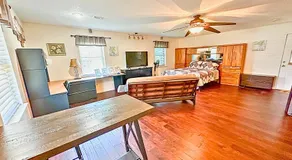 TX Speedway Studio: Desk + Cowboy Dipping Pool by Vacation Your Way - Image 2