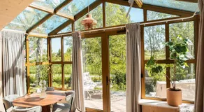 Holiday Home in Friesland with Greenhouse Charm - Image 3