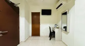 Collection O Axlite Hotel - Image 4