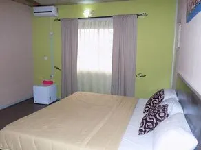 Posh Apartments and Hotel - Image 2